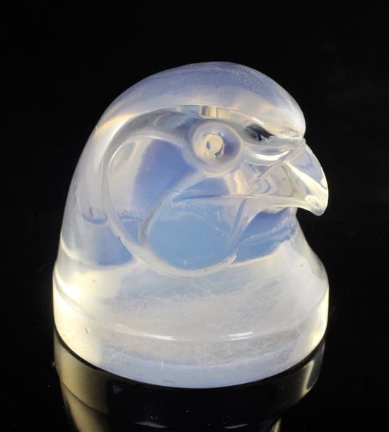 Tête dEpervier/Hawks Head. A glass mascot by René Lalique, introduced on 21/11/1928, No.1139 Height 6cm.
